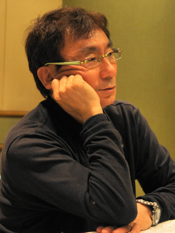 丸山 和範の人物写真